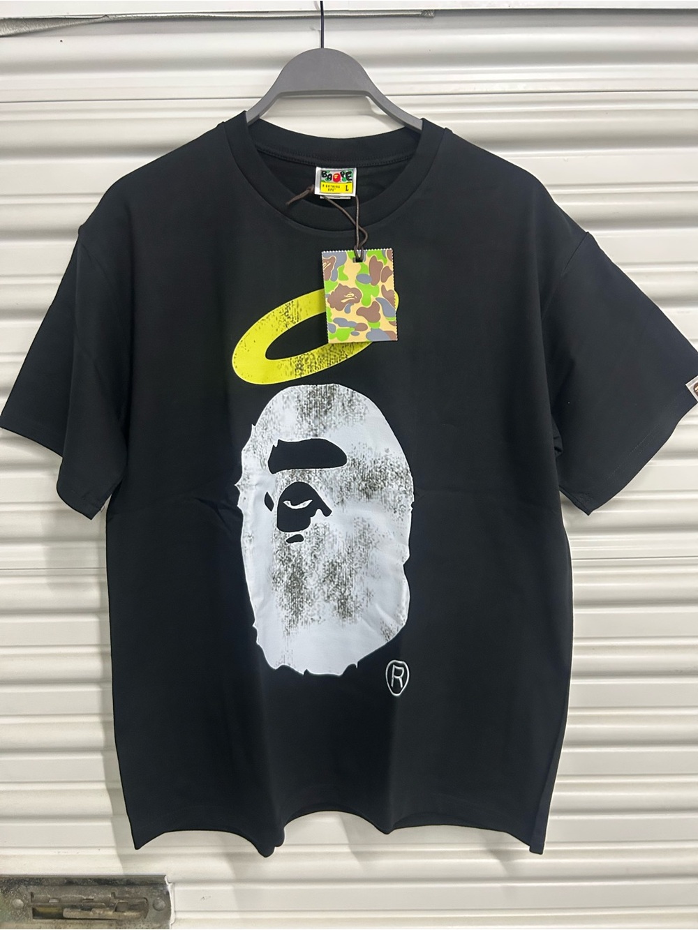 Black Short-Sleeve Graphic Tee with White Ape Motif and Yellow Halo